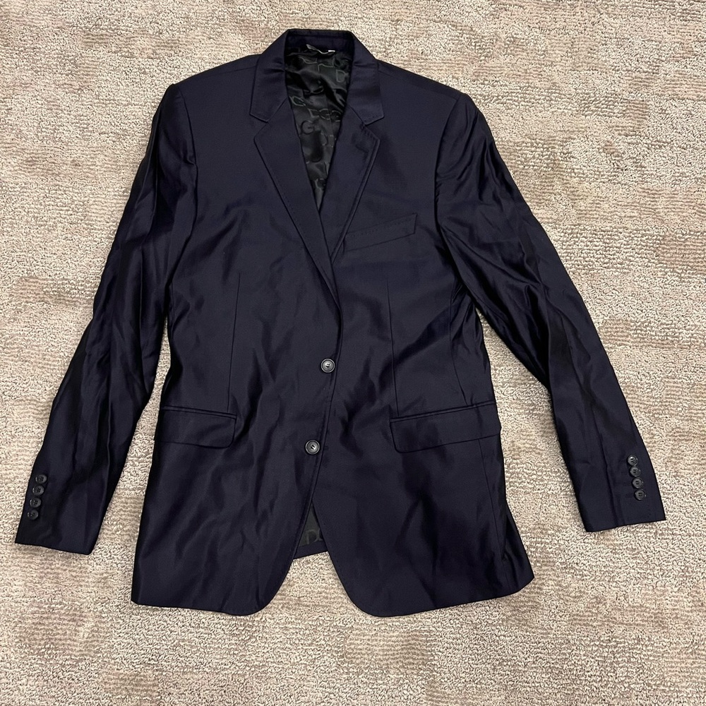 Dolce and Gabbana sharkskin suit.
